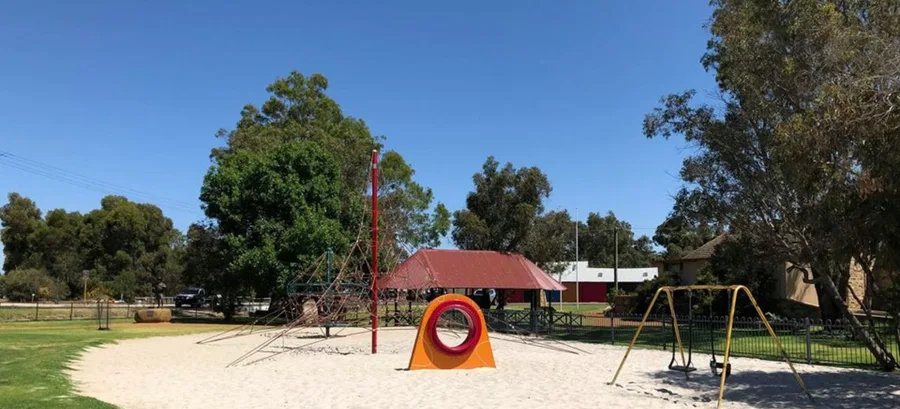Playground, shade trees and lawns at the town park in Kojonup