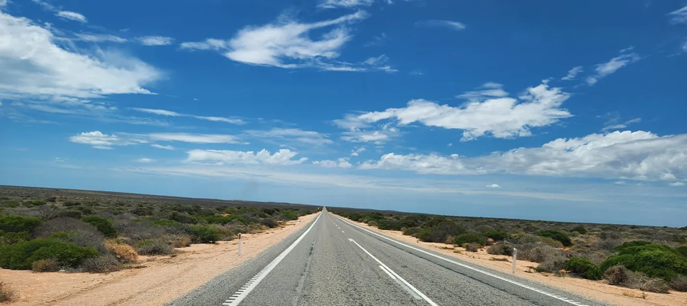 A long straight stretch of open outback highway in Western Australia