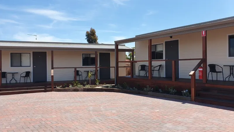 Verandahs and brick courtyard at Cornwall House Accommodation in Kojonup