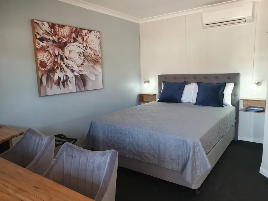 A tidy queen room with ensuite, the kind of quiet, self-contained space that suits a couple's short stay